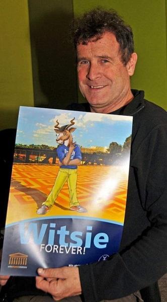 Musician Johnny Clegg with a Witsie Forever poster